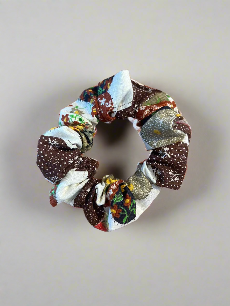 Multicolored fabric scrunchie on a white surface