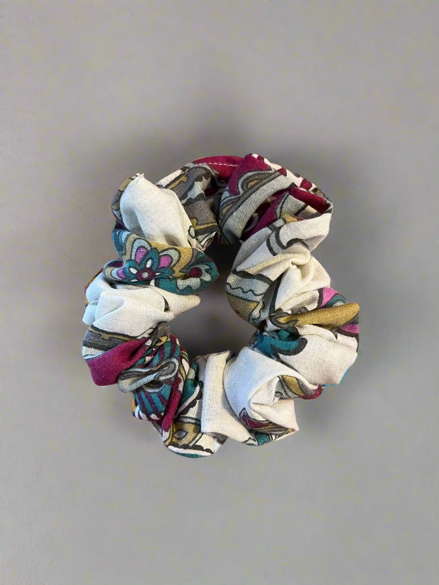 Multicolored scrunchie on a white surface