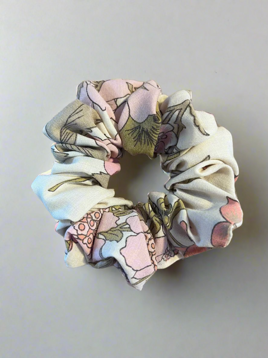 Floral patterned scrunchie on a white surface