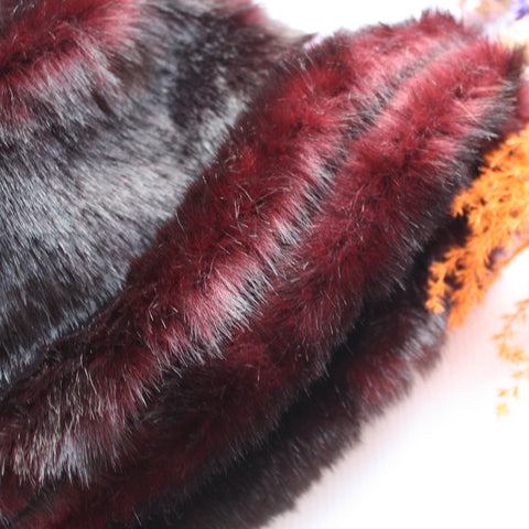 Dark burgundy faux fur winter hat. She is made using a beautiful dark burgundy remnant faux fur, with a complimenting cotton lining.