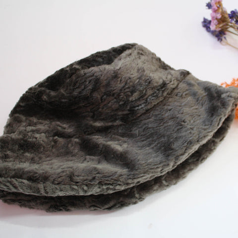 Charcoal grey faux fur bucket hat. She is made using a beautiful grey remnant  faux fur, with a complimenting cotton lining.