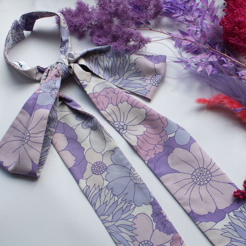Double XL purple flower power pussy bow.  The ultimate maximalist accessory, this detachable pussy bow is made from a vintage St Michael flower power bedsheet in a gorgeous bright purple.